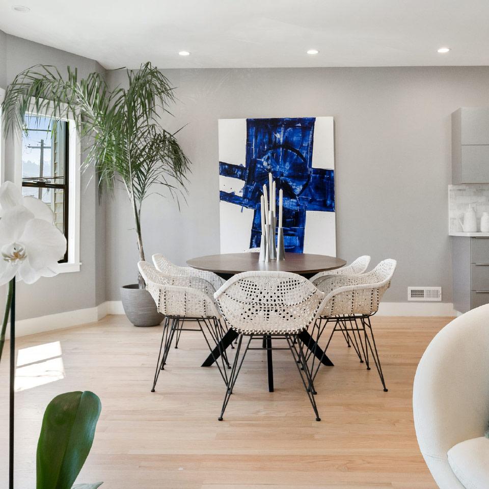 View of a dining room with abstract art