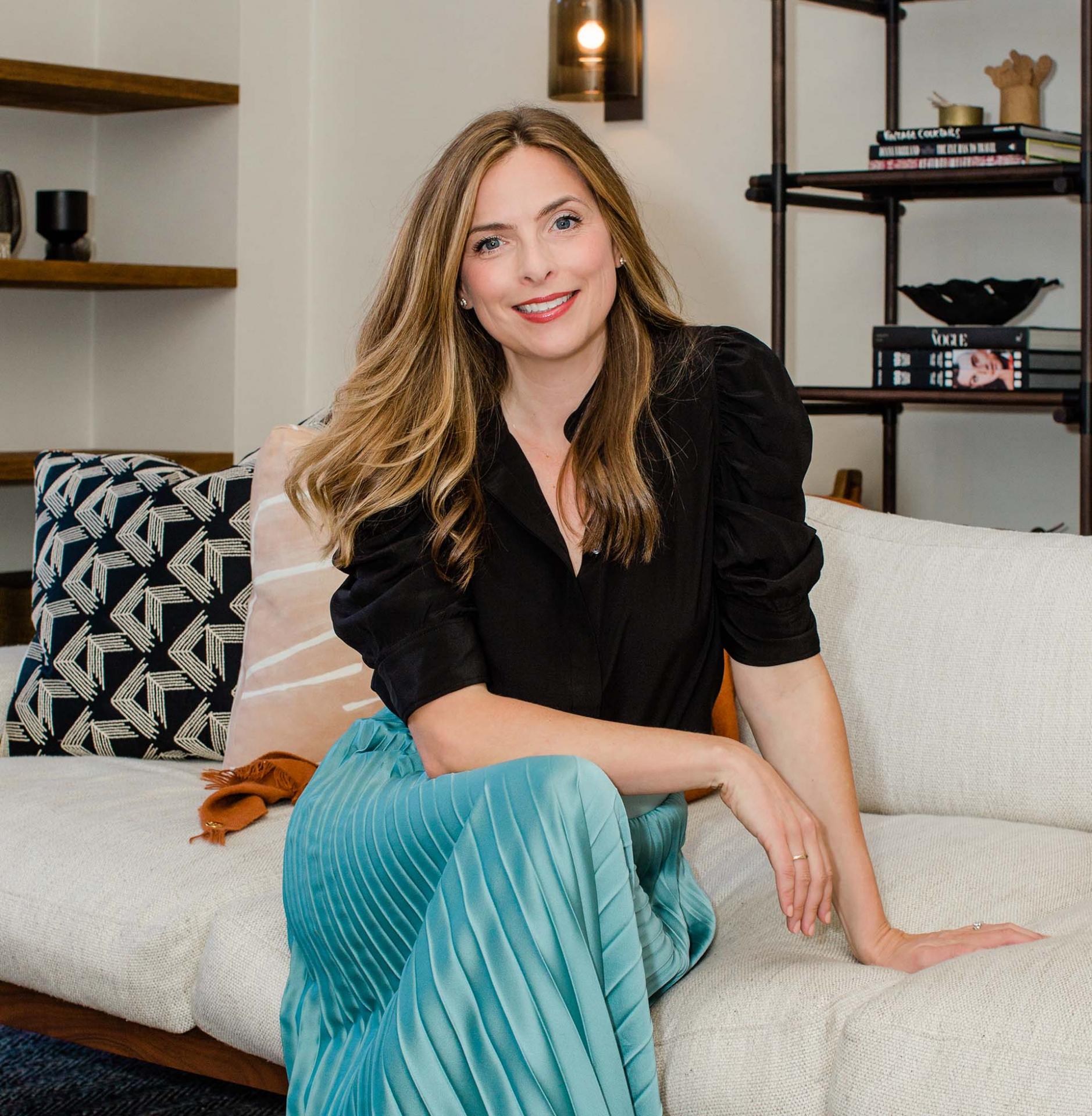 Shannon-Hughes-Couch Image of real estate agent, Shannon Hughes