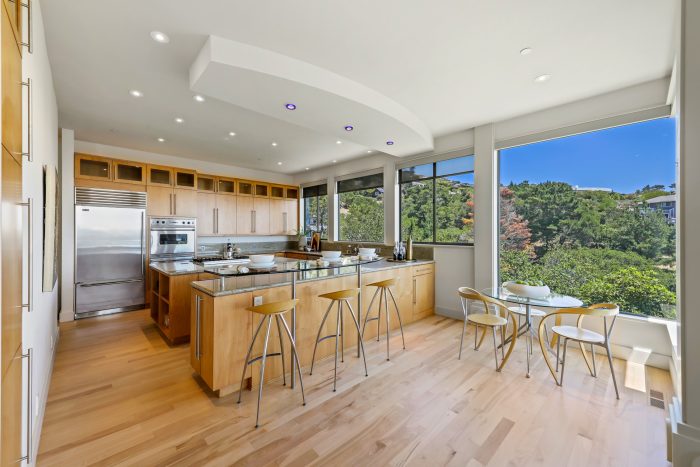 Kitchen with wood floors and scenic views