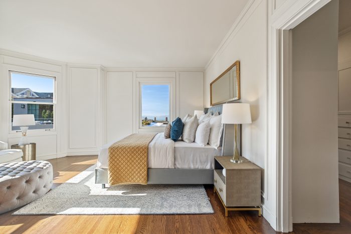 View of a bedroom with wood floors