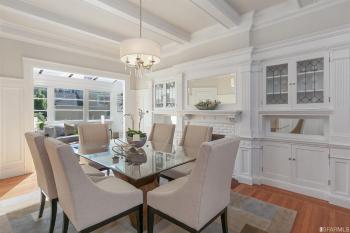 Formal dining room with wood beamed ceilings 