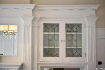 Close-up of the built-in cabinets with glass doors