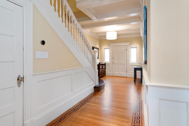 Downstairs hall at 1231 5th Avenue, showing the front door