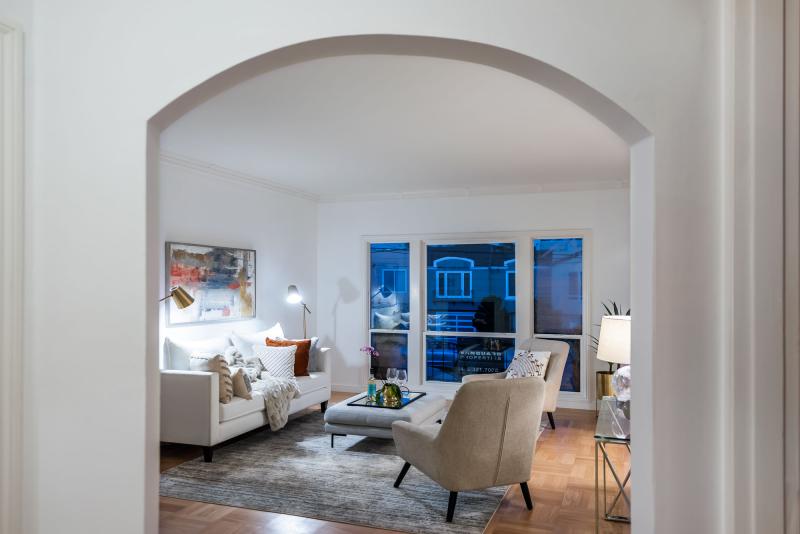 An arched doorway with views of the living area at 1635 40th Avenue