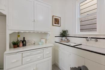 Vintage white cabinets and sink 