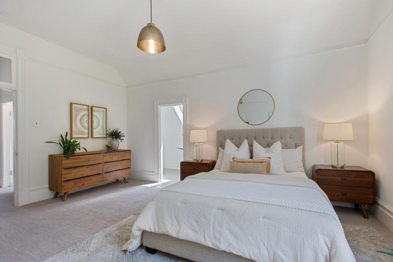 Bedroom at 32 Hartford Street, featuring plenty of space and white walls