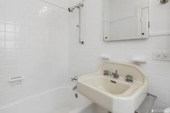 En-suite bathroom featuring white tile at 2832 Union Street