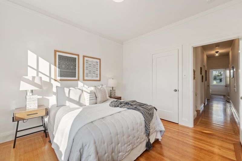 Second bedroom with a view of the hallway