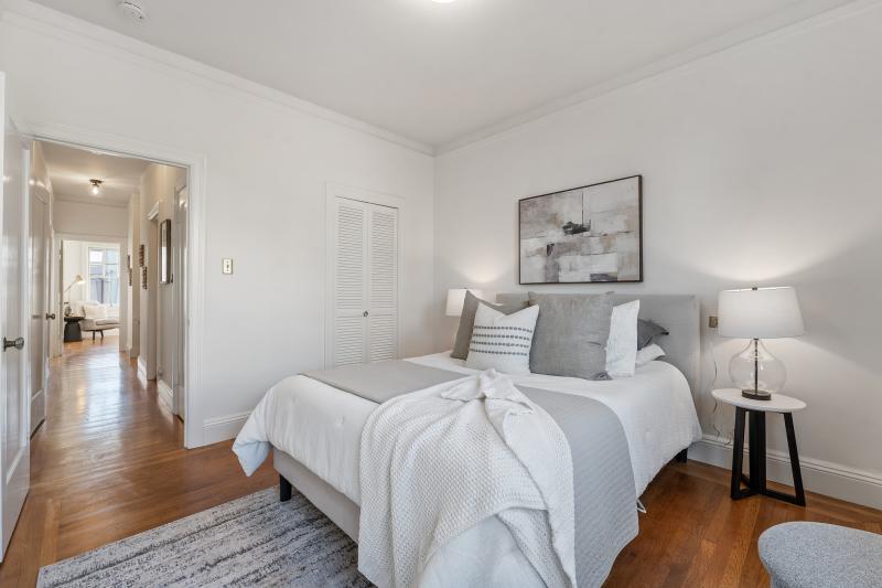 View of a bedroom looking into hallway