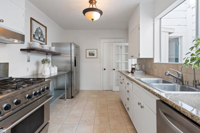 Large kitchen with stainless steel appliances