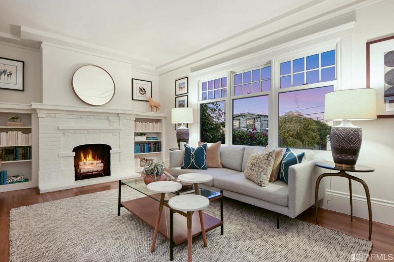 View of the living room showing a fireplace