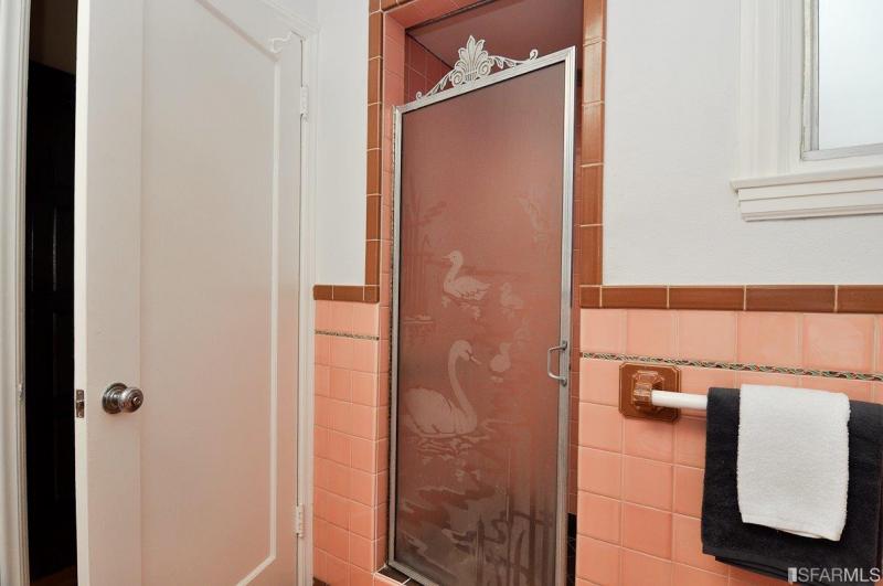 View of a bathroom, showing the shower