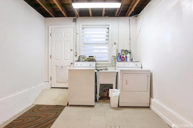 View of a laundry room with washer and dryer