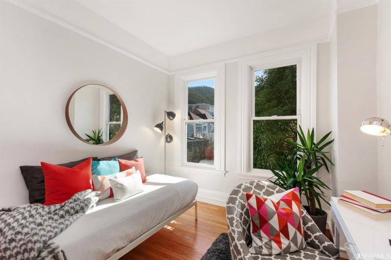 View of a bedroom with office area in unit two