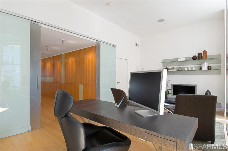 Office area with modern sliding glass doors