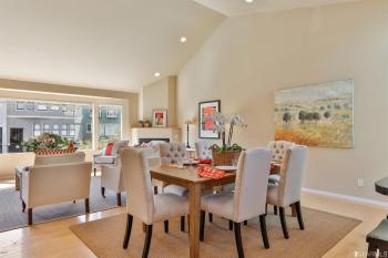 Dining area with vaulted ceilings 